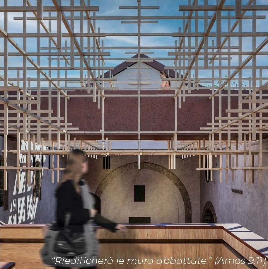 A visitor walking along a timber gallery inside the abbey ruin, under the wooden grid roof open to the blue sky.