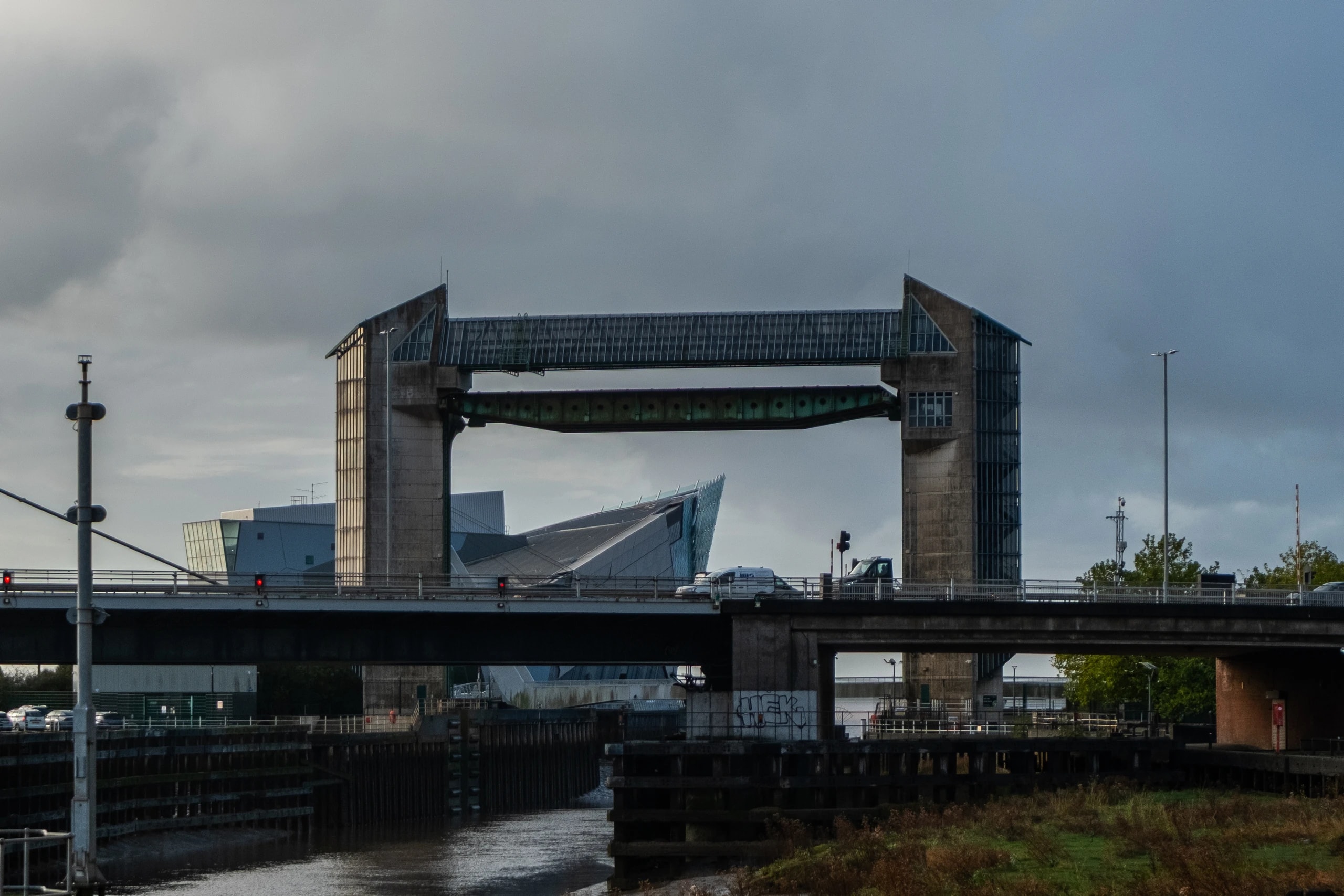 Hull waterfront infrastructure with a flood barrier and angular architecture beyond